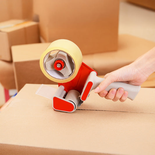 Hand Held Tape Dispenser